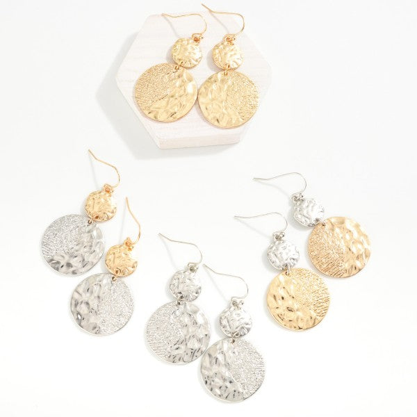 Linked multi textured metal disk drop earrings