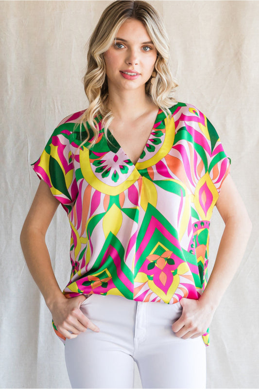 SALE! Jodifl Print top with a V-neck, short curved sleeves